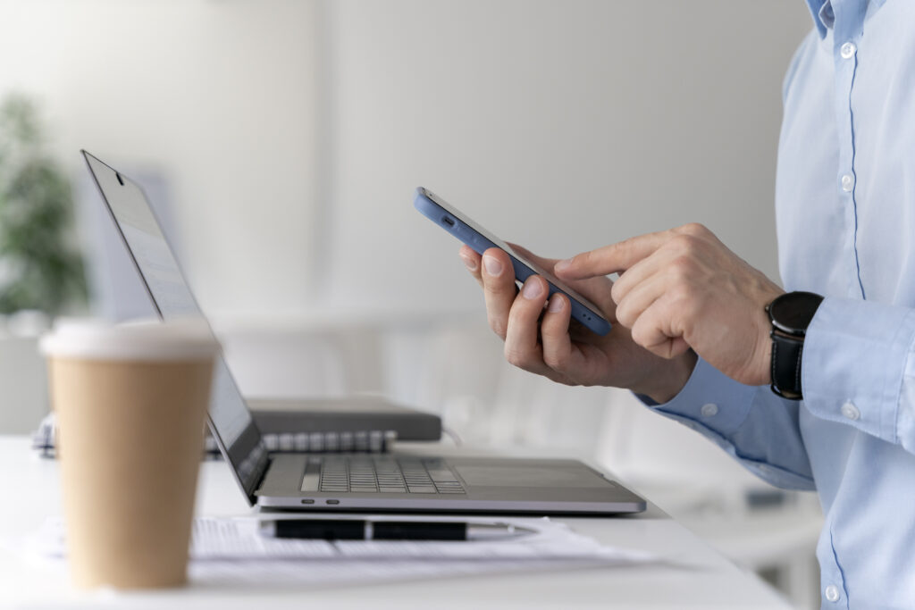 business-man-with-laptop-and-smartphone